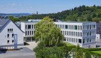 Historie trifft auf Moderne: Die MNT GRUPPE hat in Limburg ein neues Firmengebäude in den ehemaligen Pallottiner Klostergärten errichtet. 