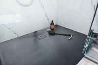 Der natürliche matte Look der Duschwannen in Steinoptik macht jedes Badezimmer zu einem optischen Highlight.<br />Bild: HSK