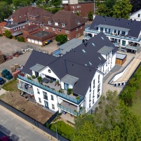 In einem neu erstellten Wohn- und Geschäftshaus in.......