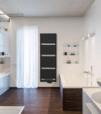 Grauer Design-Heizkörper Aster mit farbgleichem Blower und schwarzem Ventilsatz als Mittelanschluss. <br />Bild: Vasco<br />