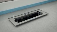 Für die ebenerdige Installation hat FRÄNKISCHE den zweiteiligen starline Bodeneinbaurahmen entwickelt: Über vier Stellschrauben lässt sich der Rahmen auf die Höhe des Bodens justieren. <br />Bild: FRÄNKISCHE Rohrwerke<br />