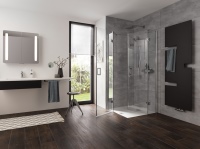 Mit dem Red dot Award ausgezeichnet: das innovative Pendel-Scharnier Aperto, das den Einstieg in die Dusche noch komfortabler macht.<br />Bild: HSK