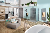 Urlaubfeeling zuhause: Das komfortable Badezimmer lädt zum Träumen ein.<br />Die luxuriöse Duschabtrennung PASA von Kermi wurde über KermiEXTRA<br />individuell gestaltet.<br />Bild: Kermi