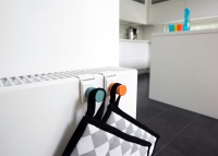 Bei der Herbstaktion von Purmo erhält der Endkunde für je zwei gekaufte Planheizkörper Ramo oder Plan je einen attraktiven Design-Handtuchhaken Knob kostenlos dazu.<br />Bild: Rettig Germany GmbH
