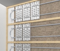 Die Wärmeverteilung erfolgt von den Heizleitungen über die Thermoleitbleche direkt auf die Wandoberfläche. Dank des direkten Übertragungsweges kommt die PYD-ALU WALL Trocken mit einer Vorlauftemperatur von ca. 30° C aus. <br />Bild: PYD-Thermosysteme