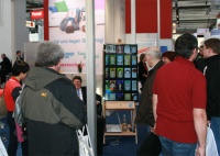 Am gemeinsamen Stand des Heizungsjournals und HaustechnikDialogs erfreuten sich die Besucher über digitale Karikaturen.