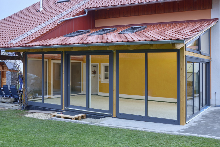 Blickfang Wintergarten: Der transparente Anbau bietet...